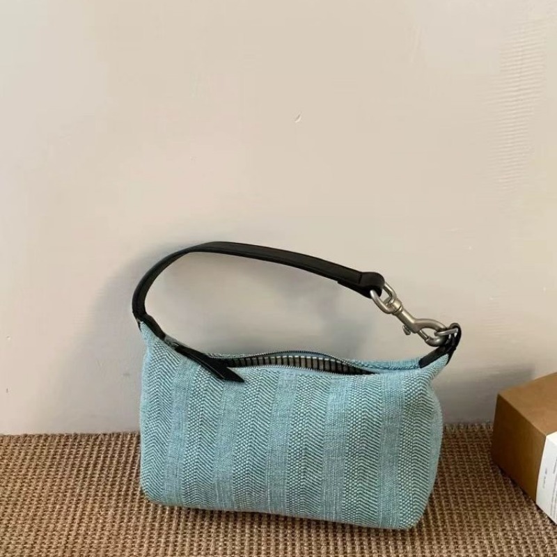 Urban Elegance Handbag Collection Featuring Merged Materials - Versatile Designer Fanny Pack