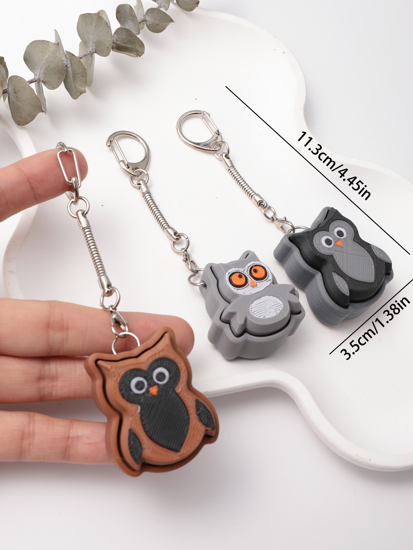 3D printed owl keychain - an adult stress relief toy with a portable anxiety-reducing gadget featuring a clickable keyboard design