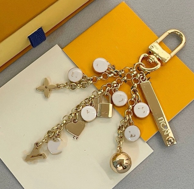 Luxurys keychain designer bag charm gold chain flower for Christmas Women Buckle jewelry Keyring Bag chain couple charm Car Key 4 colors