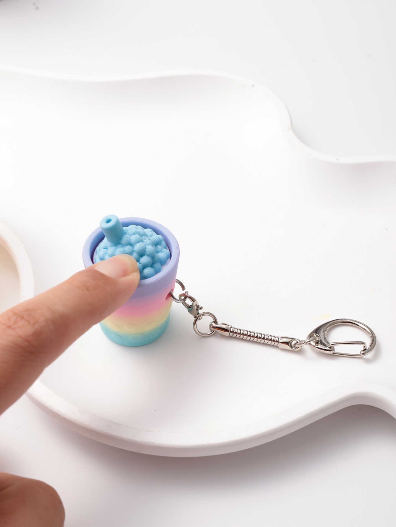 3D printed milk tea cup-shaped keychain - adult stress relief toy, with a portable anxiety relief gadget featuring a clickable keyboard design