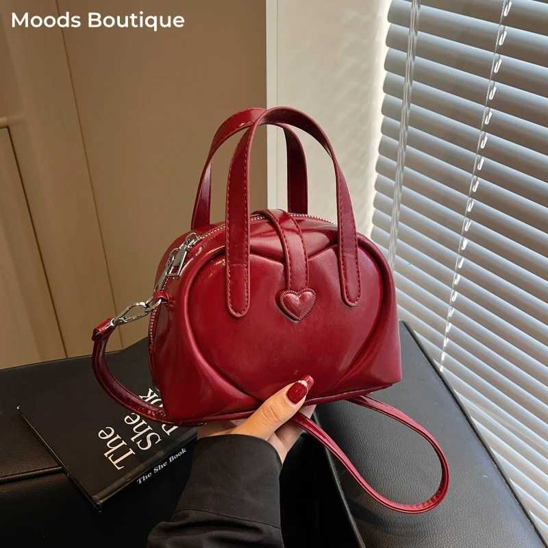 2025 Sweet Heart Decorated Mini Shoulder Crossbody Bags for Women Latest Designer Handbags Luxury Pure Color Top-handle Saddle Bag Y250725