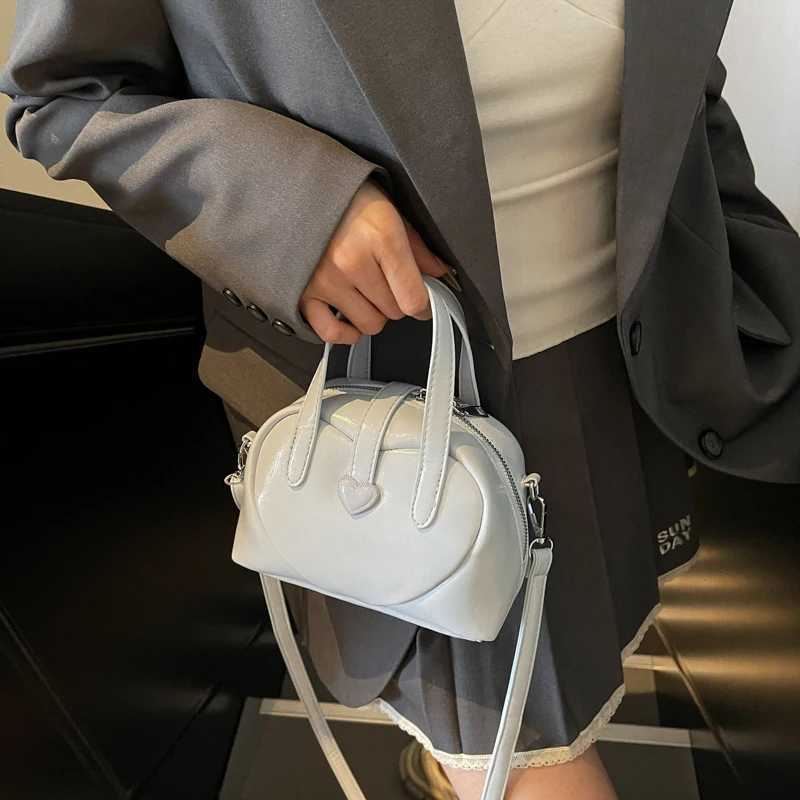 2025 Sweet Heart Decorated Mini Shoulder Crossbody Bags for Women Latest Designer Handbags Luxury Pure Color Top-handle Saddle Bag Y250725