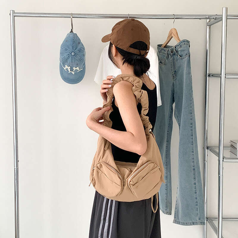 2025 Summer New Pleated Nylon Fabric Solid Color Single Shoulder Niche Lotus Leaf Drawstring Casual Versatile Crossbody Bag for Women