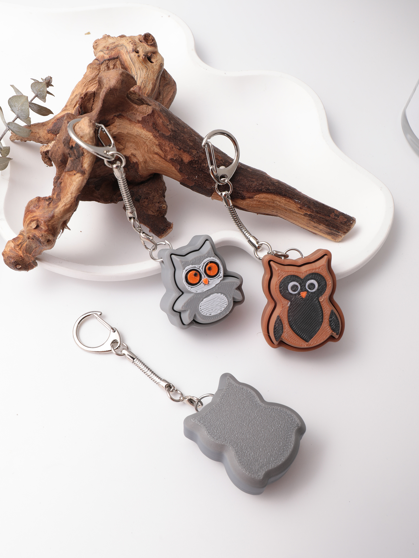 3D printed owl keychain - an adult stress relief toy with a portable anxiety-reducing gadget featuring a clickable keyboard design