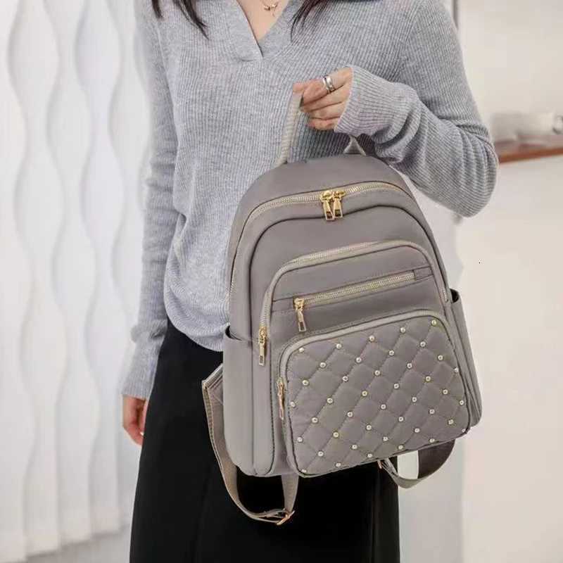 Travel backpack double-shoulder bag reliable travel schoolbag mens large-capacity multi-purpose bag Y250724