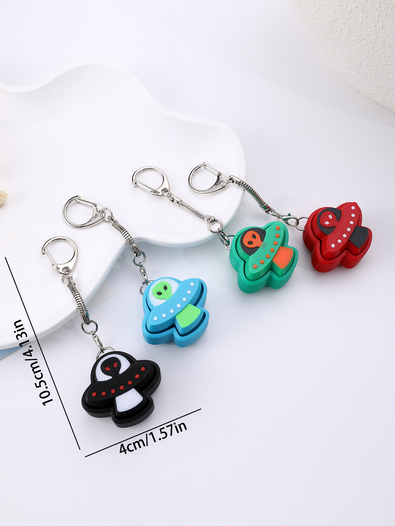 3D printed alien keychain - an adult stress relief toy with a portable anxiety-reducing gadget featuring a clickable keyboard design