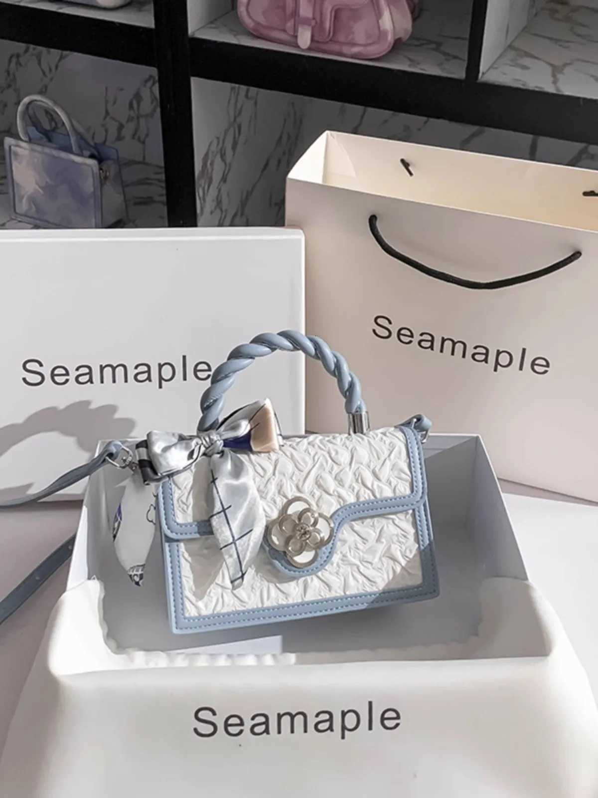 2024 New Fashion and Popular Handheld Square Bag with Contrasting Color and Delicate Flower Metal Decoration Shoulder Messenger Bag Y250725