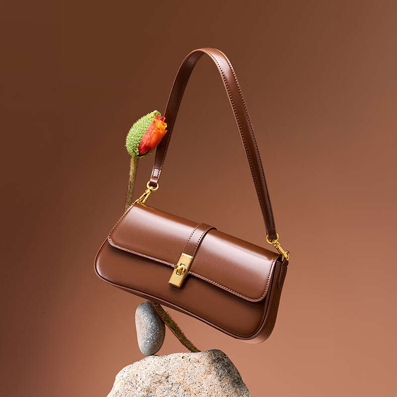 High-Quality Cowhide Niche Baguette with a Sense of Sophistication, Underarm for Women, 2025 New Designer Luxury Versatile Shoulder and Crossbody Bag