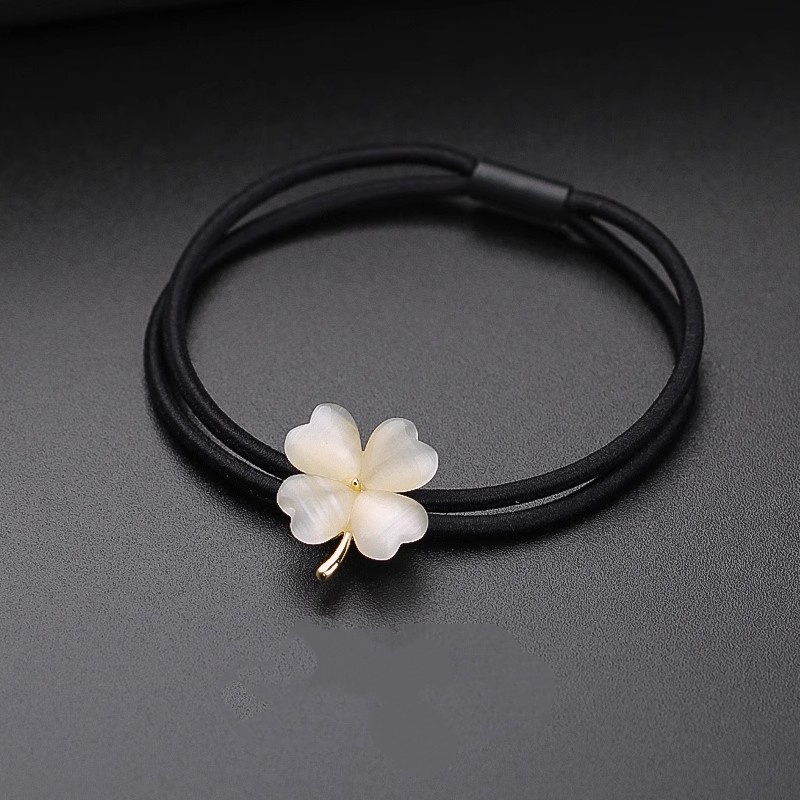 Imitation cat's eye stone four leaf clover headband, women tie their tails in a high-end and niche style, tie their hair with high elasticity rub