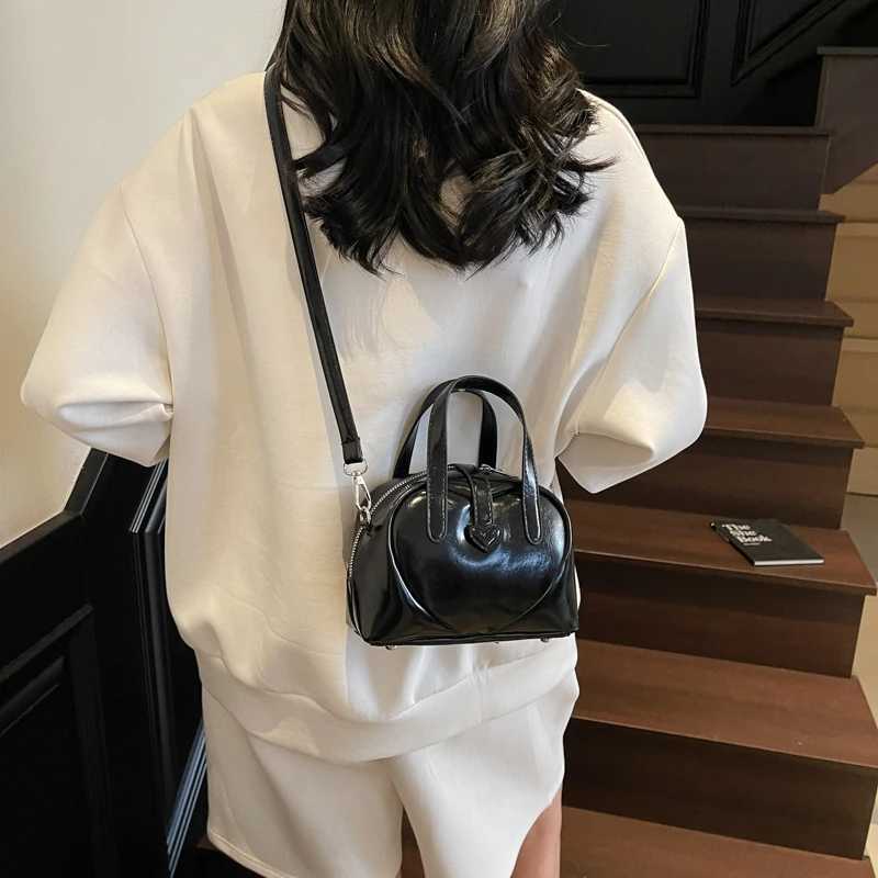 2025 Sweet Heart Decorated Mini Shoulder Crossbody Bags for Women Latest Designer Handbags Luxury Pure Color Top-handle Saddle Bag Y250725