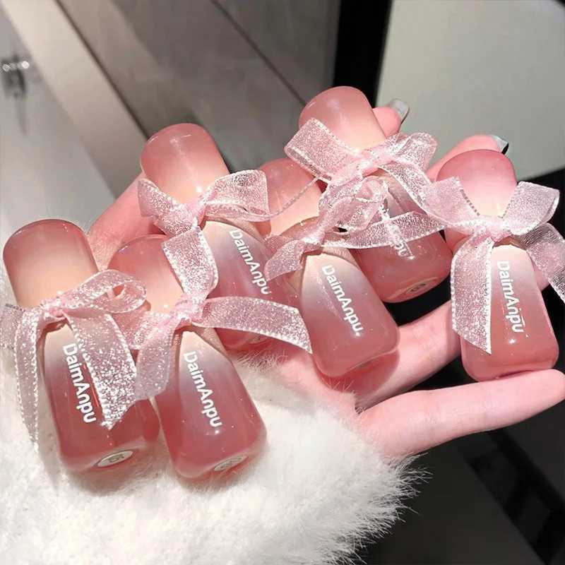 Bow Tie Moisturizing Water Lip Gloss Crystal Jelly Mirror Lips Honey Lip Lines Desalination Tender Repair Lip Gloss Lips CareXJ250724