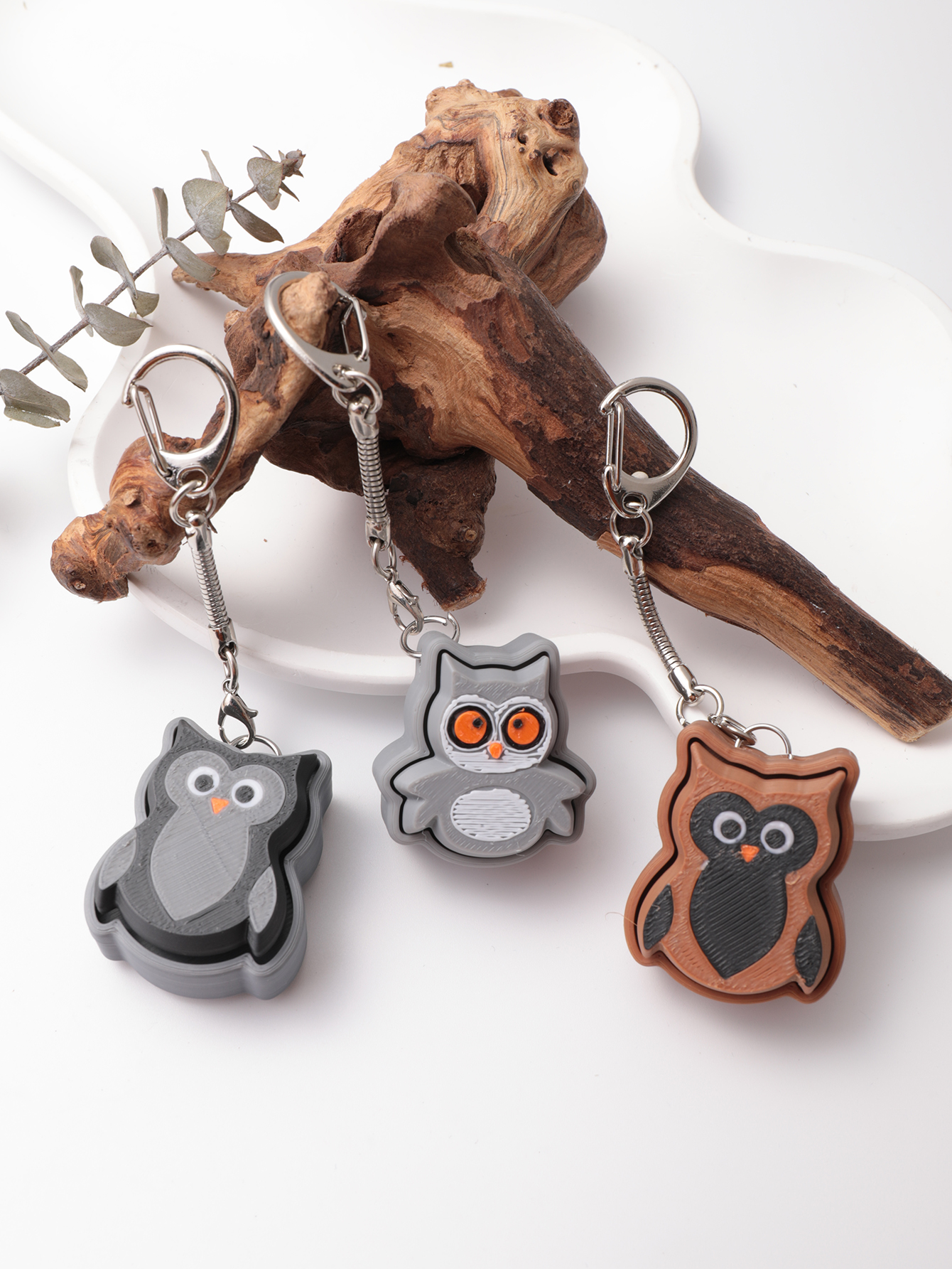 3D printed owl keychain - an adult stress relief toy with a portable anxiety-reducing gadget featuring a clickable keyboard design