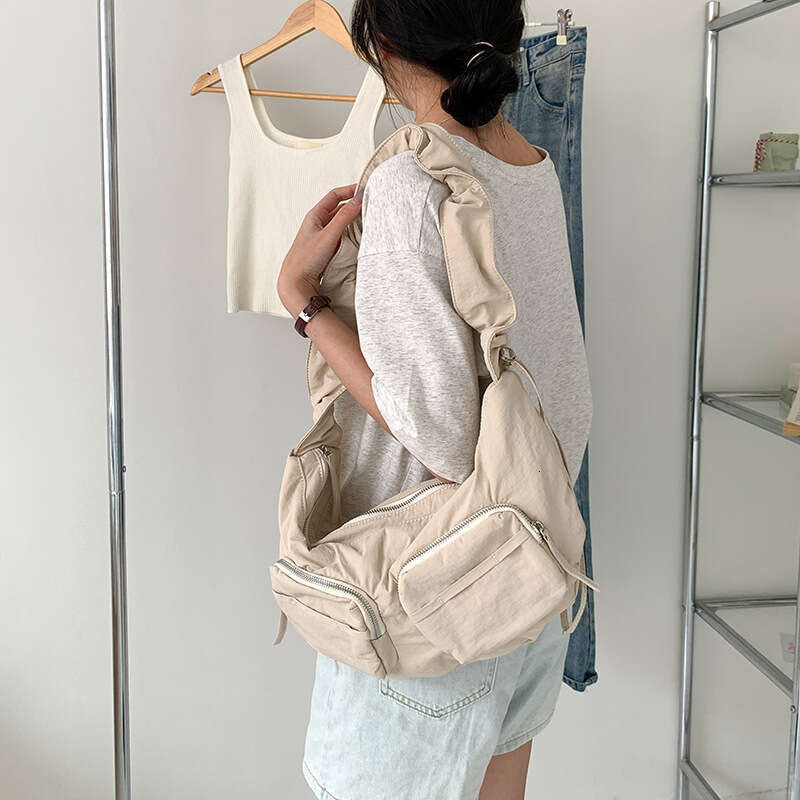 2025 Summer New Pleated Nylon Fabric Solid Color Single Shoulder Niche Lotus Leaf Drawstring Casual Versatile Crossbody Bag for Women