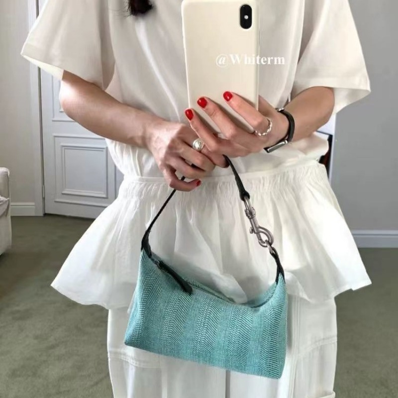 Urban Elegance Handbag Collection Featuring Merged Materials - Versatile Designer Fanny Pack