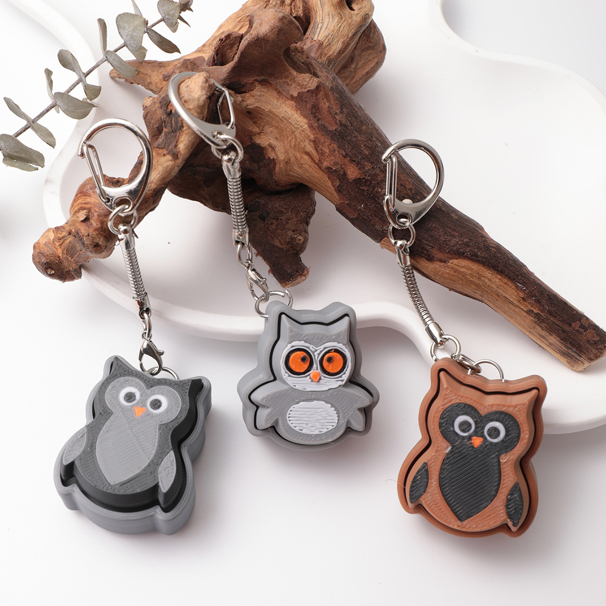 3D printed owl keychain - an adult stress relief toy with a portable anxiety-reducing gadget featuring a clickable keyboard design