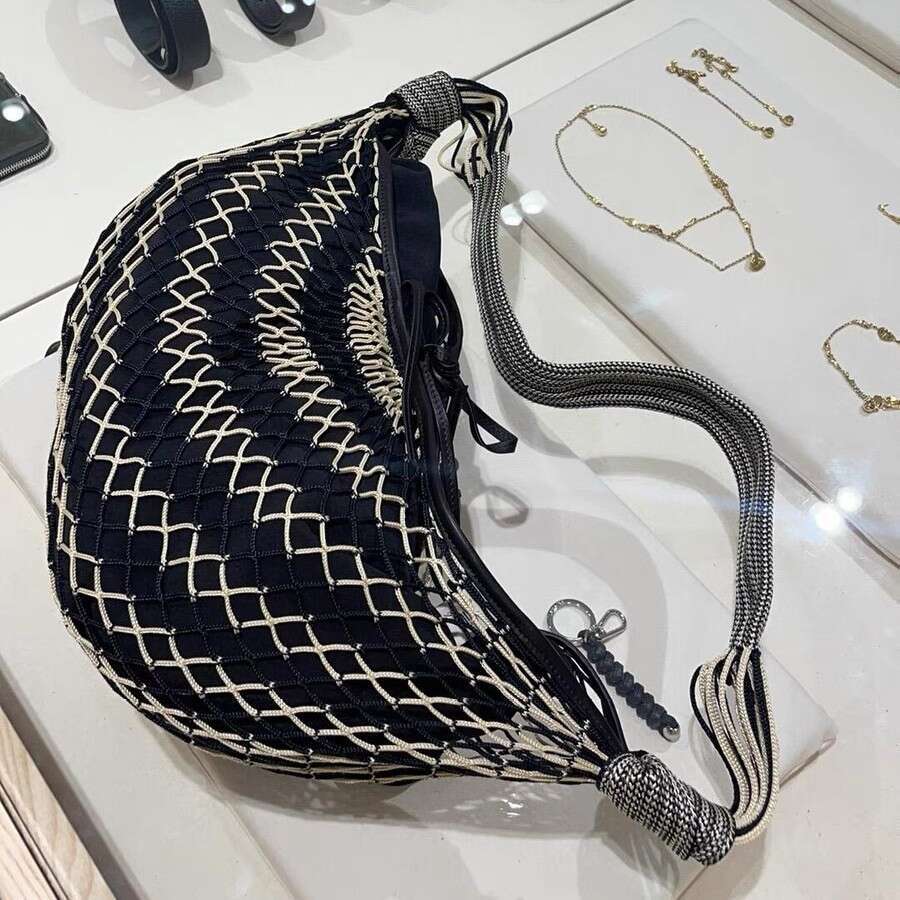 Designer Bag Tote Bag Designer Shoulder Contemporary Fashion Forward Messenger Style Satchel Featuring Distinctive Color Blocks and Horn Accents
