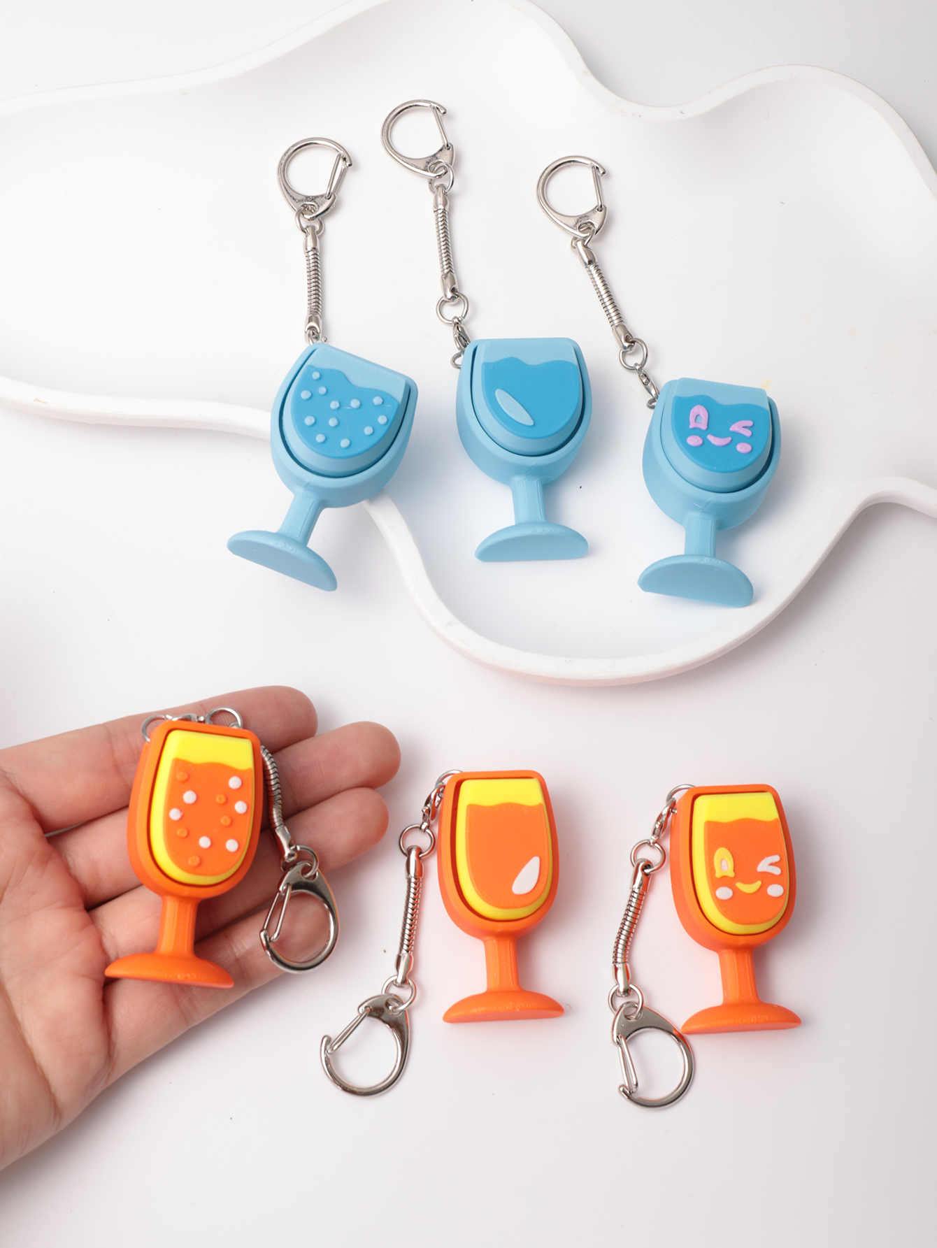3D printed cocktail cup-shaped keychain - adult stress relief toy, with a portable anxiety relief gadget featuring a clickable keyboard design