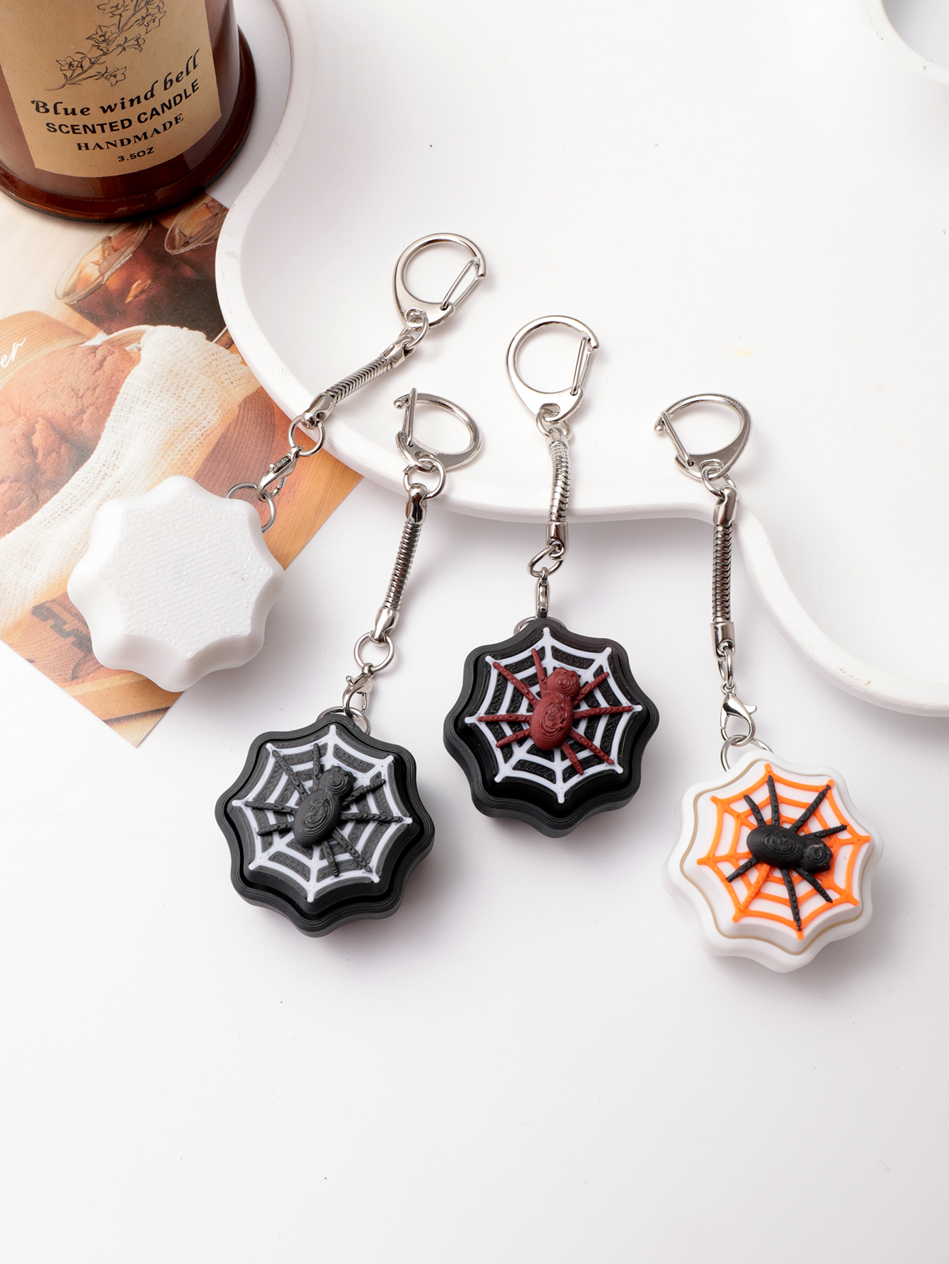 3D printed spider keychain - an adult stress relief toy with a portable anxiety-reducing gadget featuring a clickable keyboard design