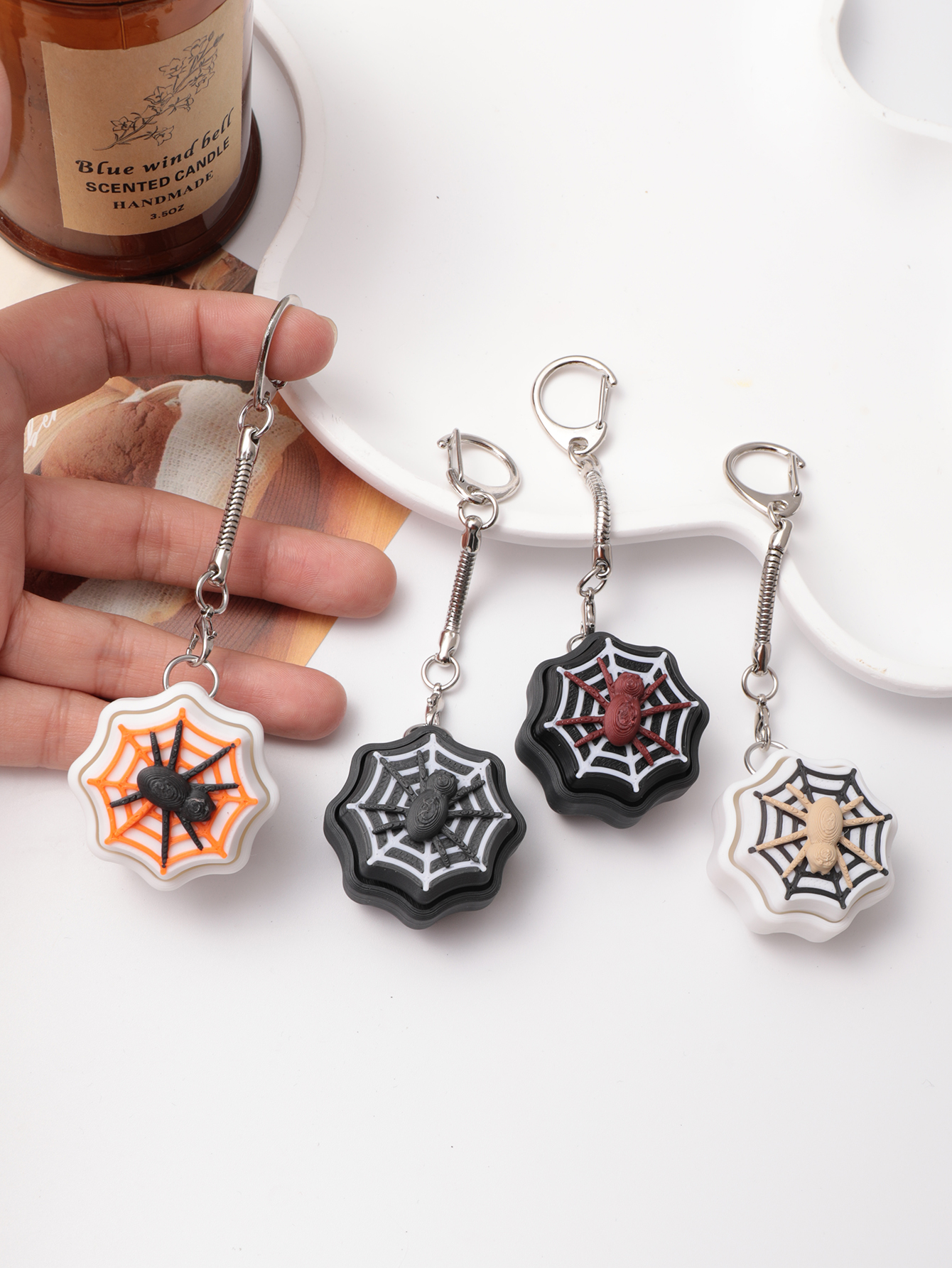 3D printed spider keychain - an adult stress relief toy with a portable anxiety-reducing gadget featuring a clickable keyboard design