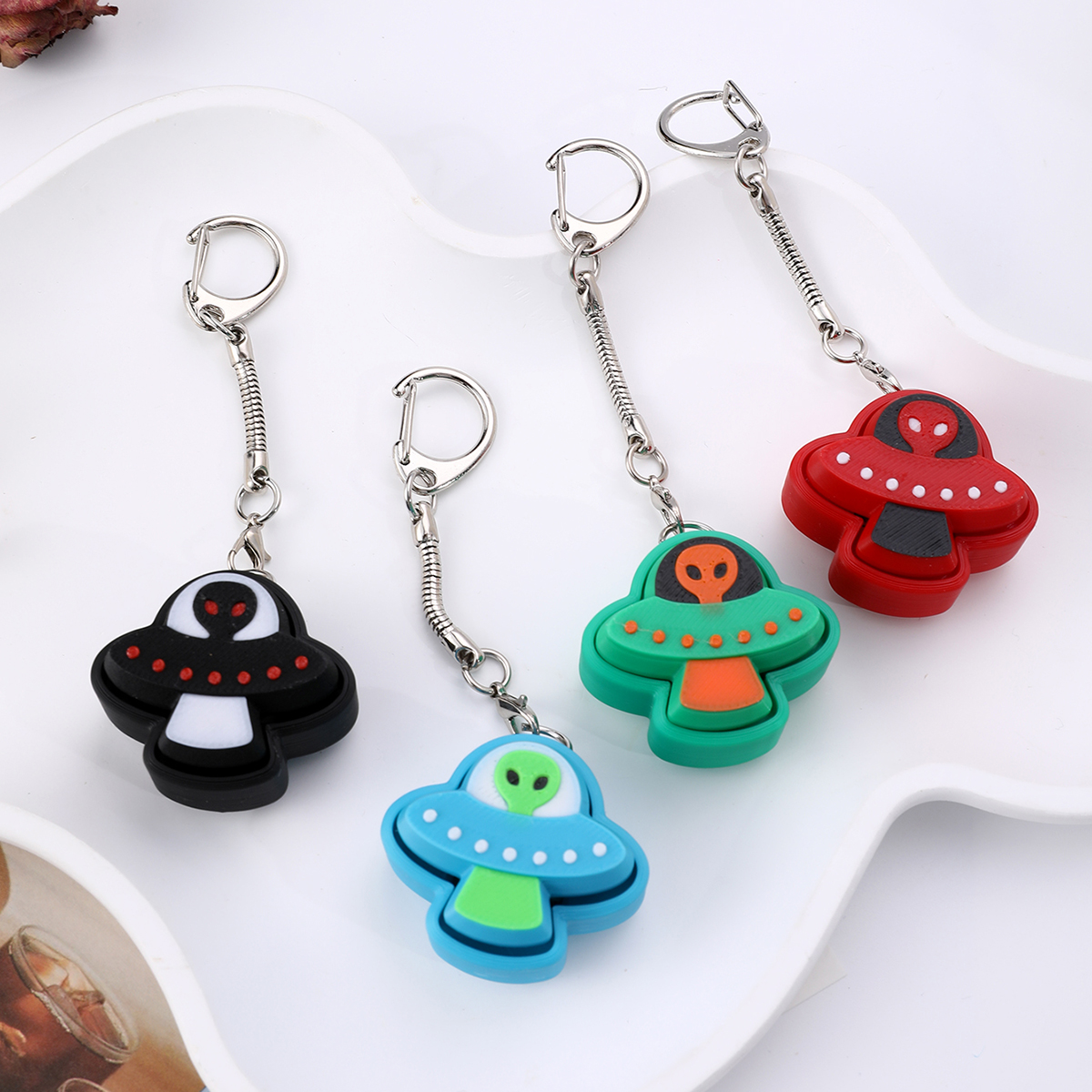 3D printed alien keychain - an adult stress relief toy with a portable anxiety-reducing gadget featuring a clickable keyboard design