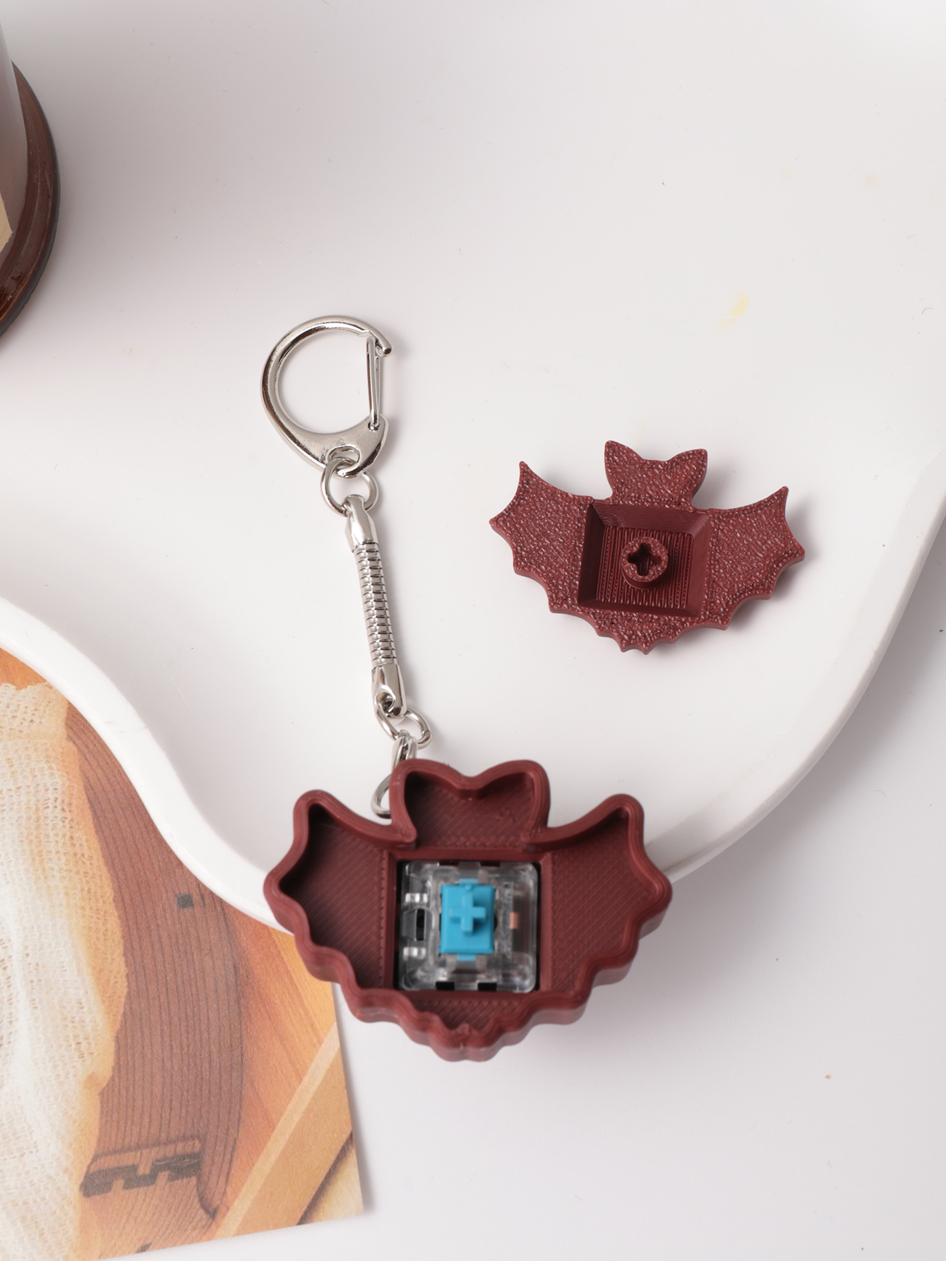 3D printed bat keychain - an adult stress relief toy with a portable anxiety-reducing gadget featuring a clickable keyboard design