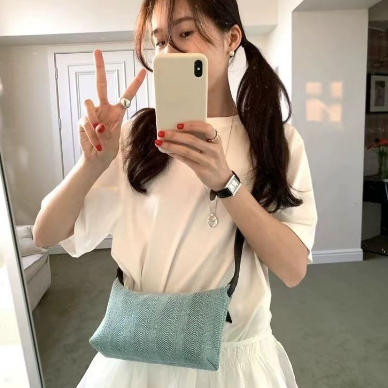 Urban Elegance Handbag Collection Featuring Merged Materials - Versatile Designer Fanny Pack