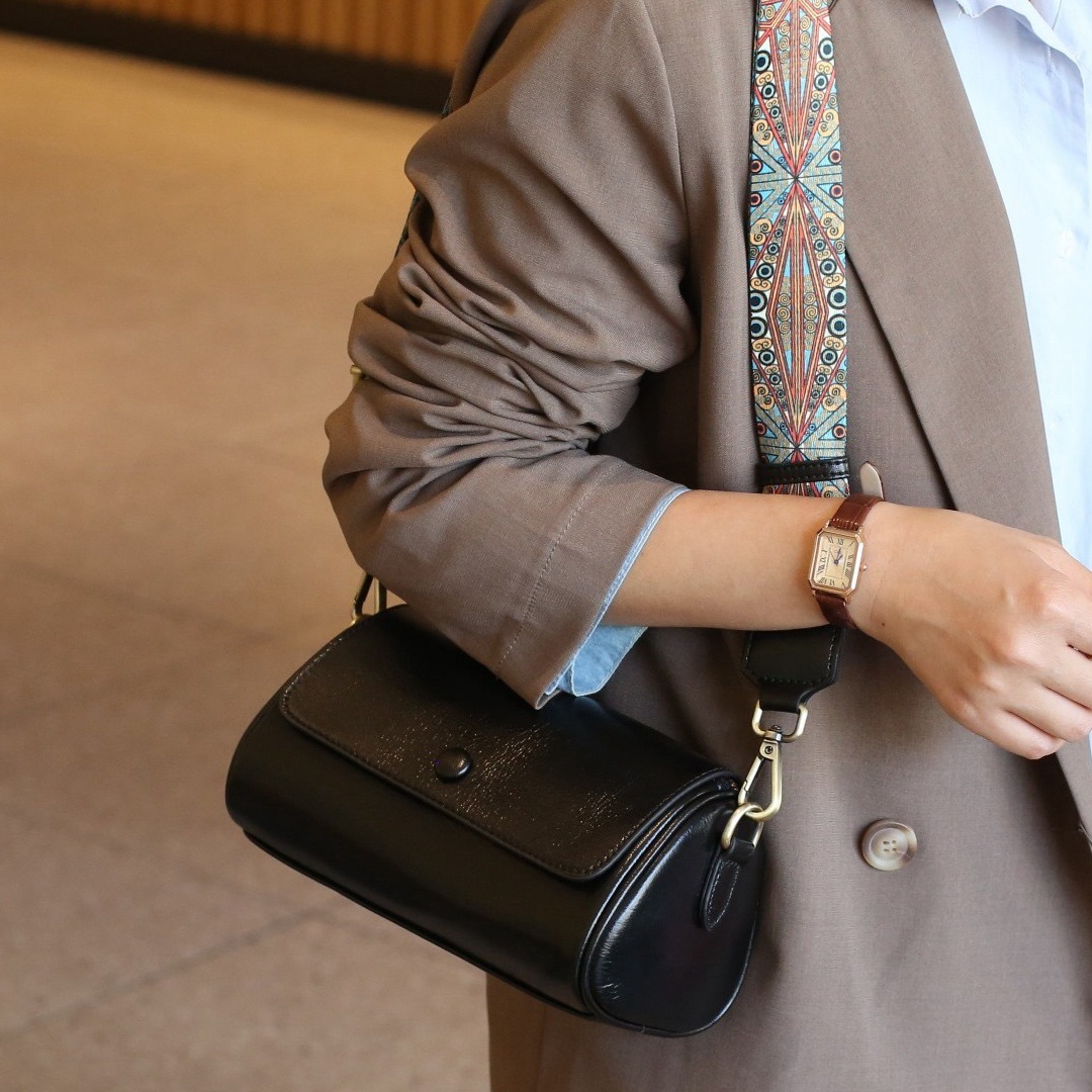 designer bag Vegetable Tanned Top Layer Cowhide Cylinder Women 2025 Spring Summer New Wide Shoulder Strap High-end Feel Single Shoulder Underarm Cross