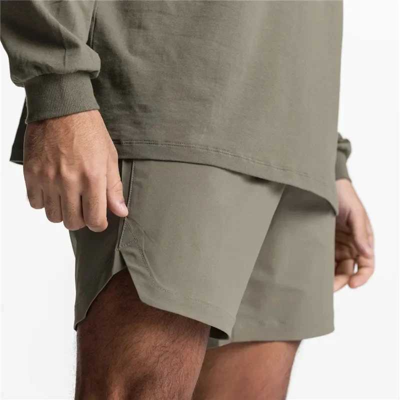 New Mens Running Quick Dry Fitness Gyms Shorts Mens Summer Short Pants Male Jogger Workout Beach Solid Color Sports Shorts Men W250724