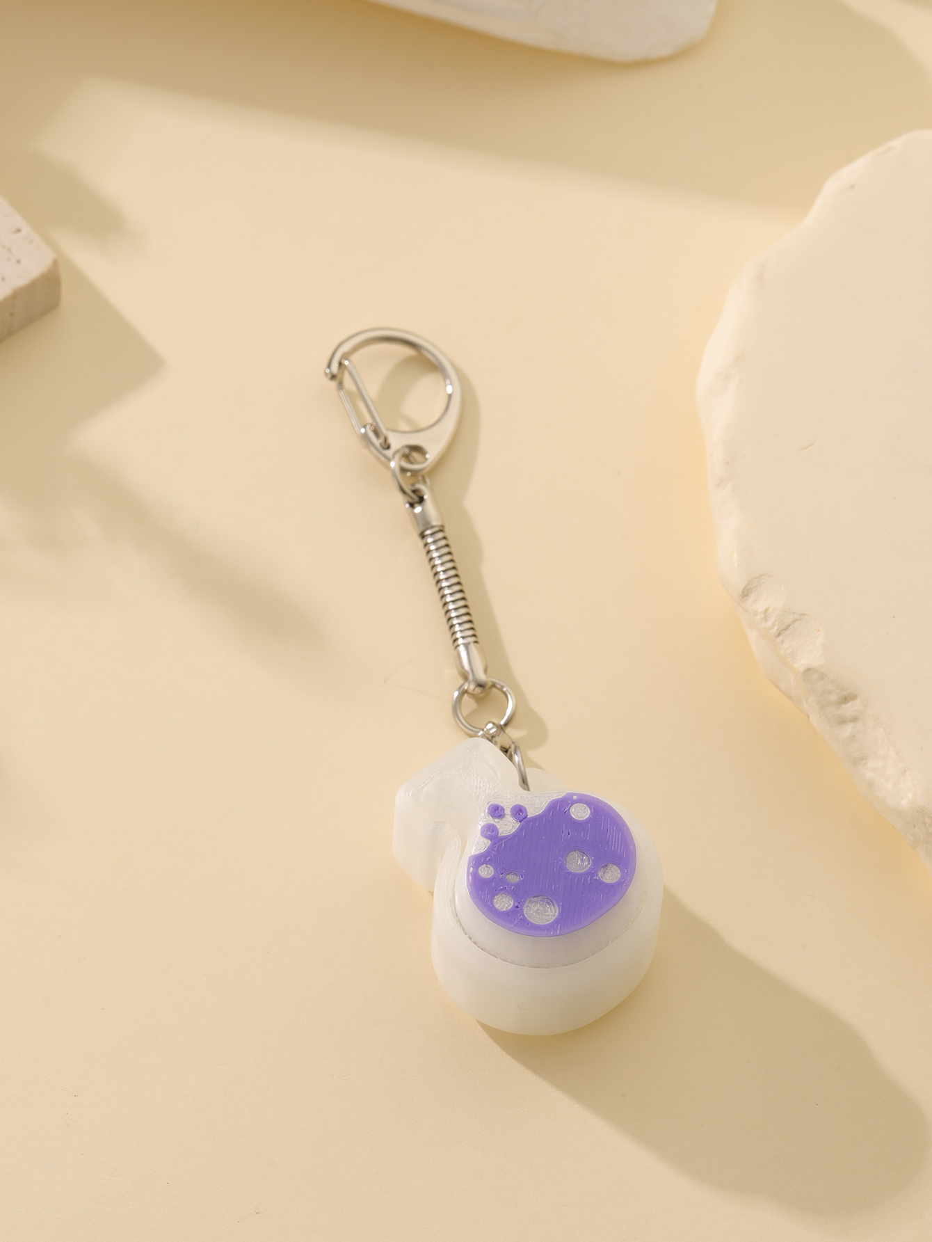 3D printed magic potion bottle pendant - an adult stress relief toy with a portable anxiety relief gadget featuring a clickable keyboard design