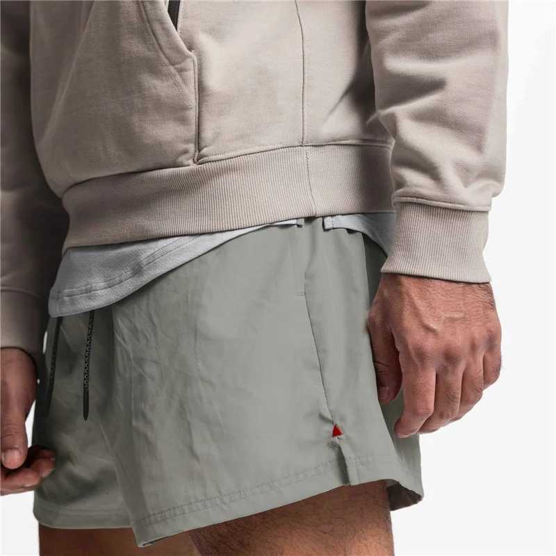 2023 New Summer Mens Sports Shorts Loose Running Gyms Workout Training Breathable Quick Drying Shorts Man Brand Short Pants W250724