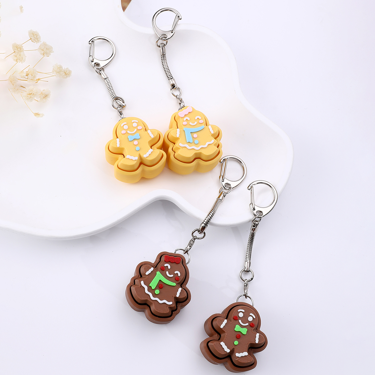 3D printed cookie-shaped keychain - an adult stress relief toy with a portable anxiety relief gadget featuring a clickable keyboard design