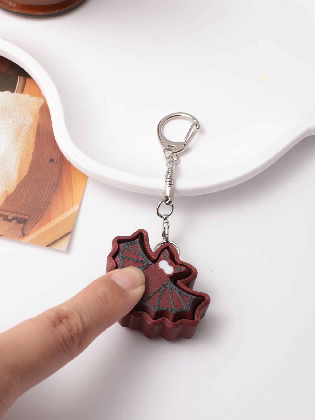 3D printed bat keychain - an adult stress relief toy with a portable anxiety-reducing gadget featuring a clickable keyboard design