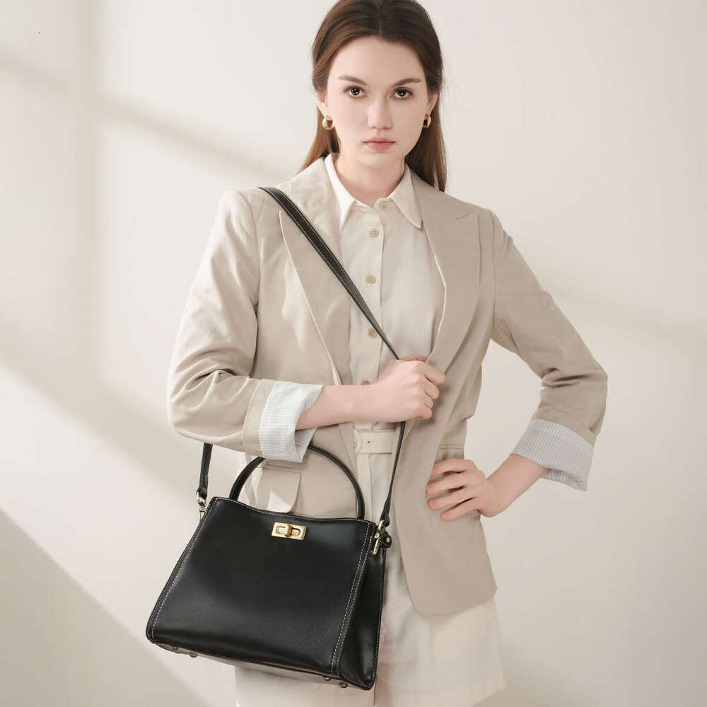 Cowhide Vintage Fashion Commuter new designer Light Luxury Handbag Simple High-end Single Shoulder Crossbody Women's Bag Versatile