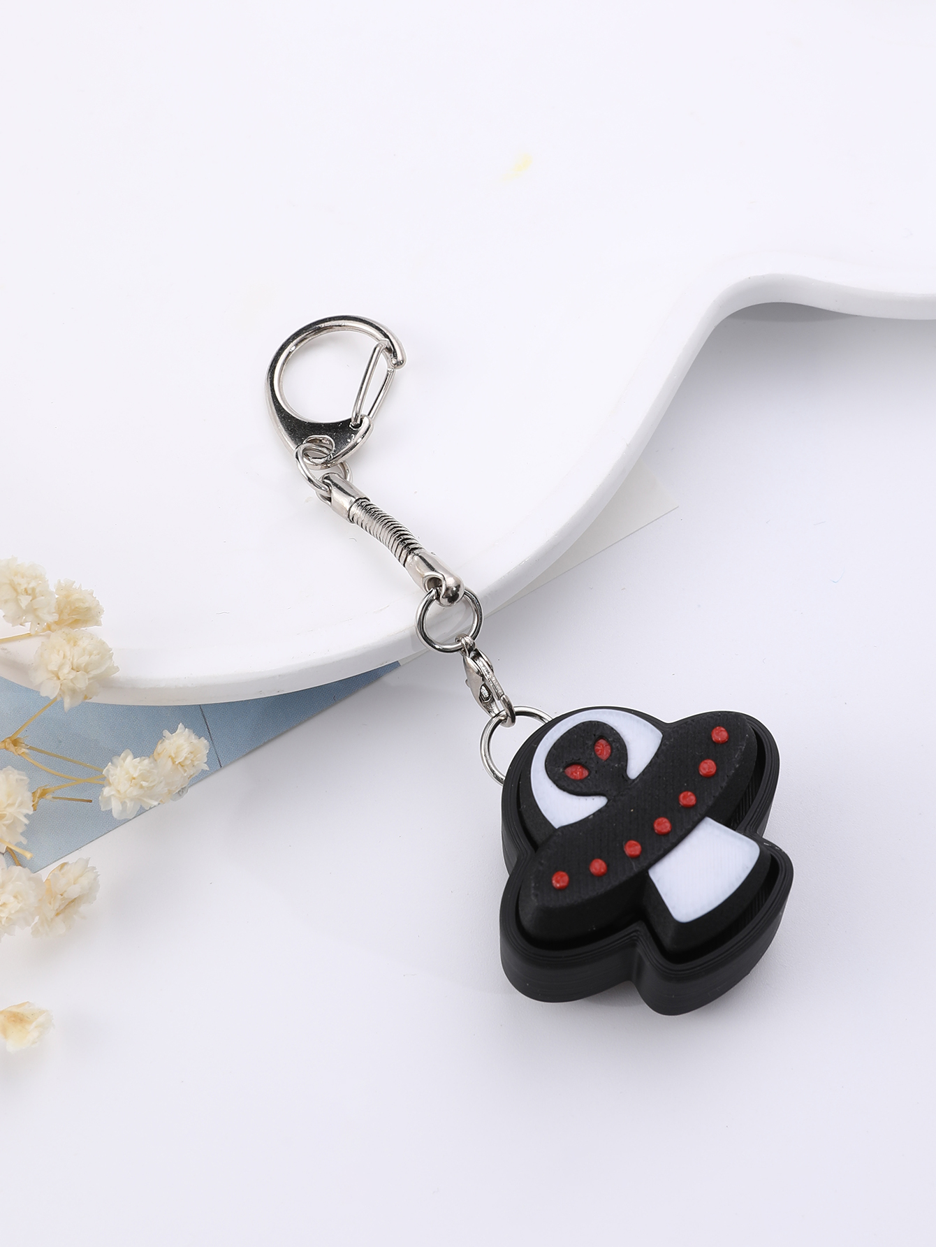 3D printed alien keychain - an adult stress relief toy with a portable anxiety-reducing gadget featuring a clickable keyboard design