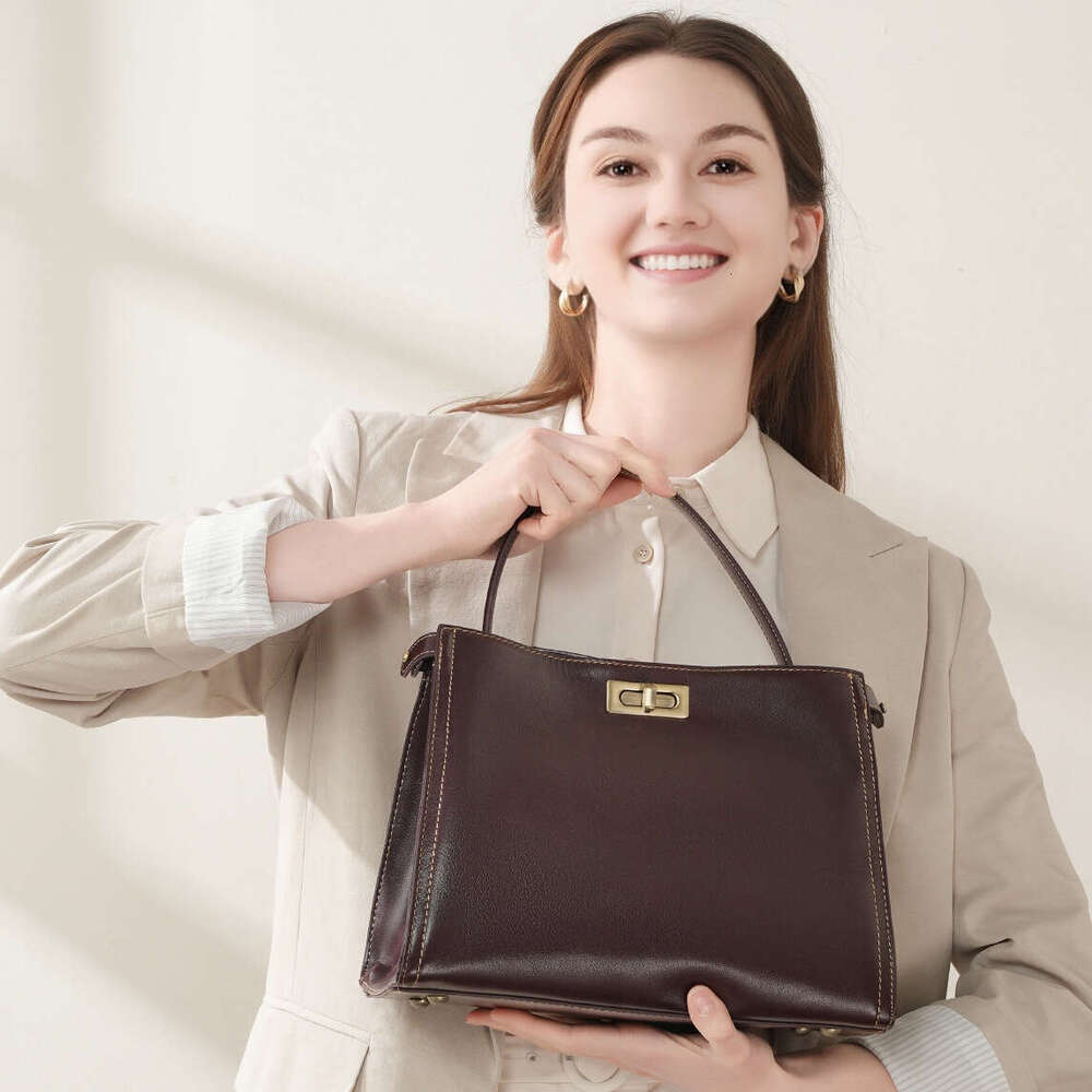 Cowhide Vintage Fashion Commuter new designer Light Luxury Handbag Simple High-end Single Shoulder Crossbody Women's Bag Versatile