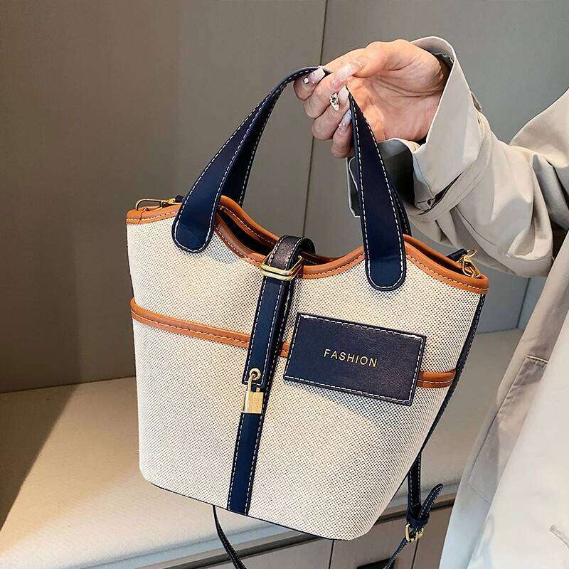 Retro Canvas PU Spliced Bucket 2024 New Women's Personalized Design Large Capacity Crossbody Bag Versatile Commuting Handbag