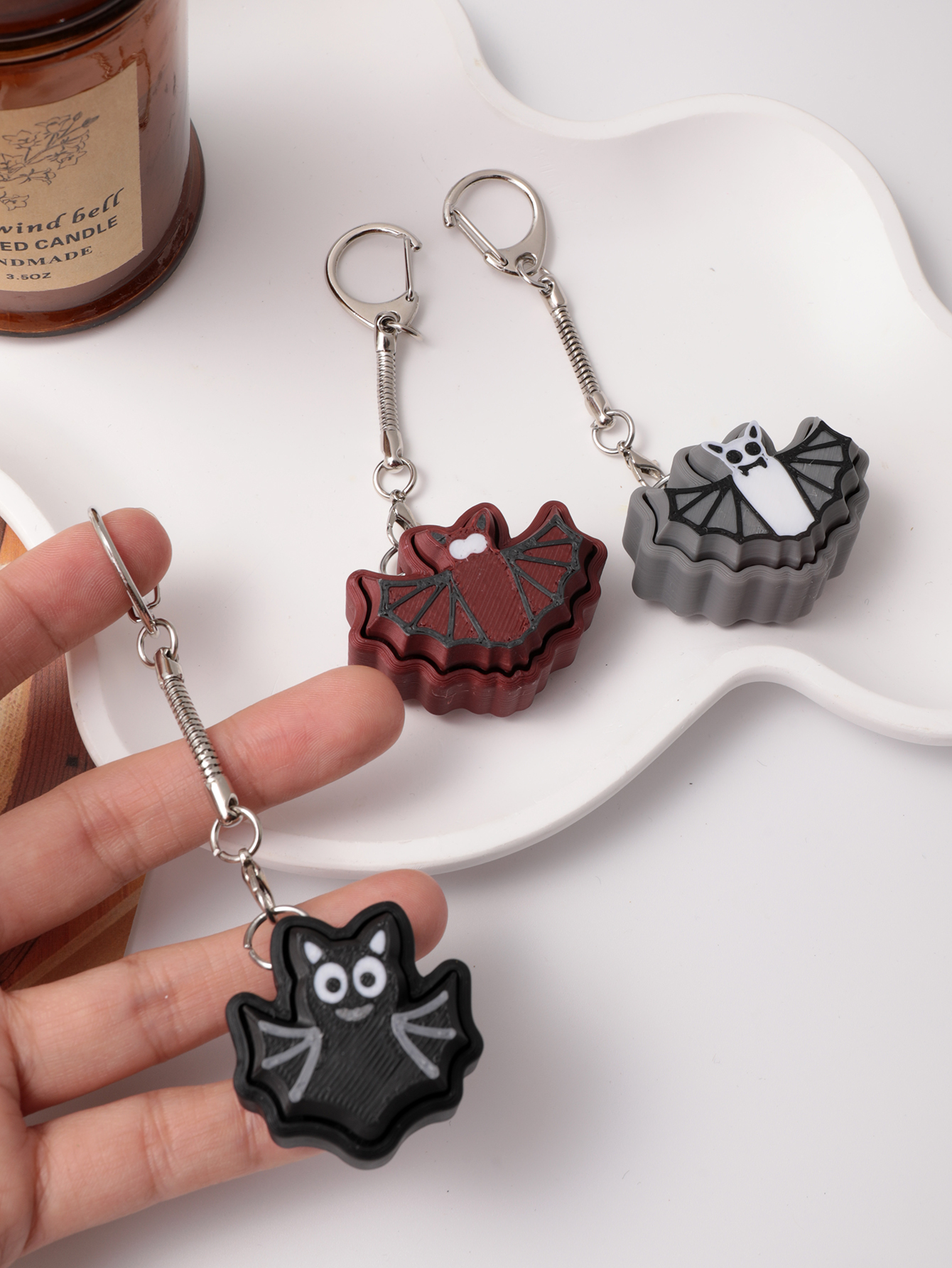 3D printed bat keychain - an adult stress relief toy with a portable anxiety-reducing gadget featuring a clickable keyboard design