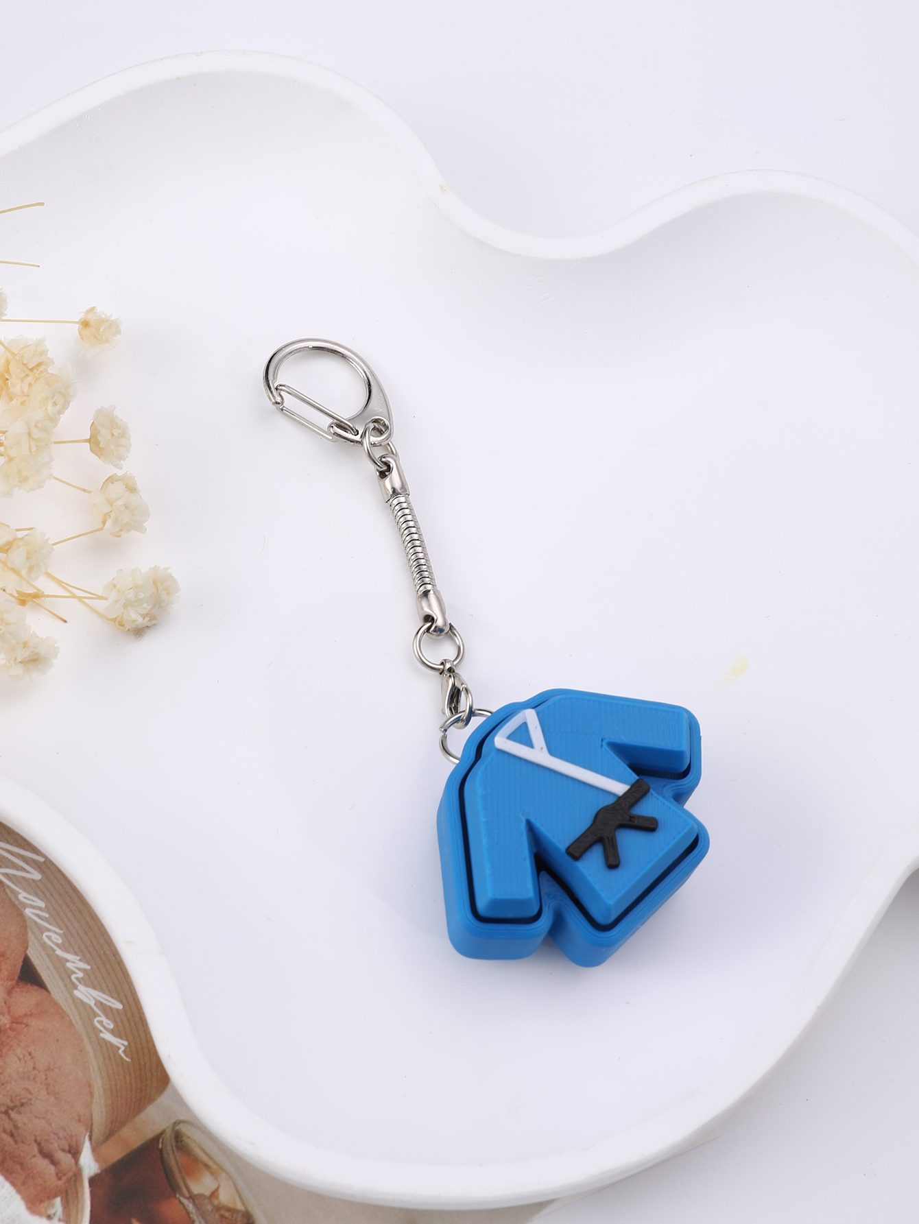 3D printed taekwondo uniform keychain - an adult stress relief toy with a portable anxiety-reducing gadget featuring a clickable keyboard design