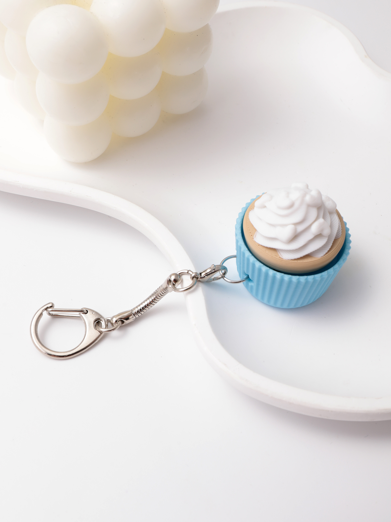 Porte-clés en forme de cupcake imprimé 3D - un jouet de soulagement du stress adulte avec un gadget portable réducteur d'anxiété avec une concept