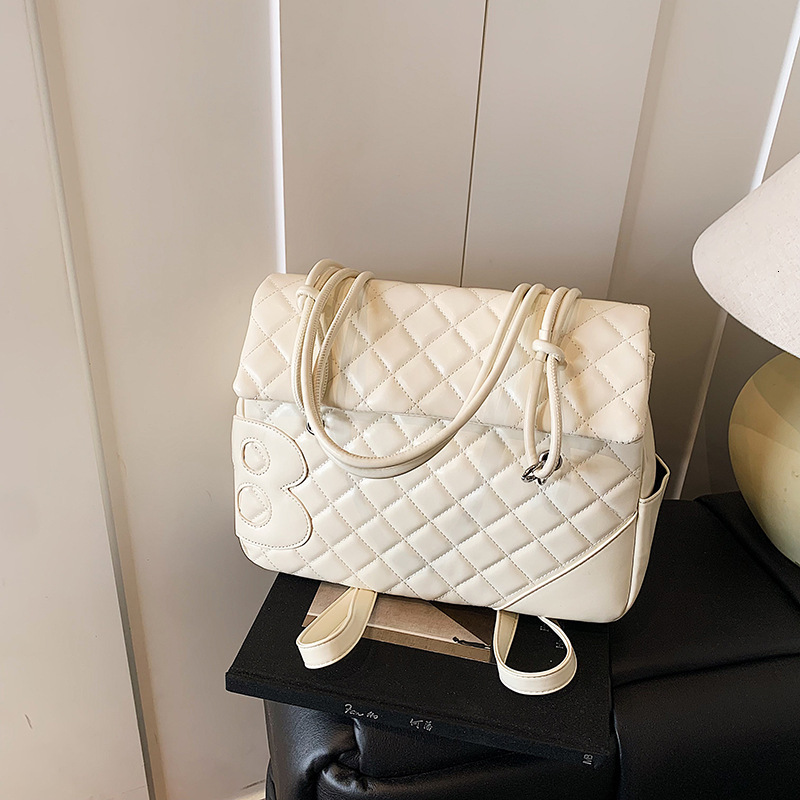 Luxury Brand Designer Bag New 2025 Kangpeng Quilted Large Tote Bag Large Capacity Commuter Crossbody Versatile Single Shoulder Double Shoulder Bag For