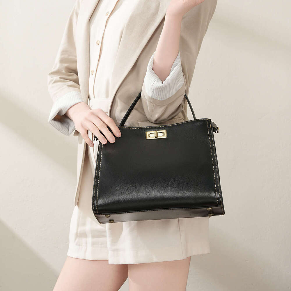 Cowhide Vintage Fashion Commuter new designer Light Luxury Handbag Simple High-end Single Shoulder Crossbody Women's Bag Versatile