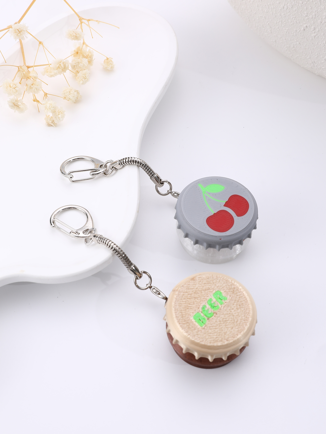 3D printed wine bottle cap keychain - adult stress relief toy, with a portable anxiety relief gadget featuring a clickable keyboard design