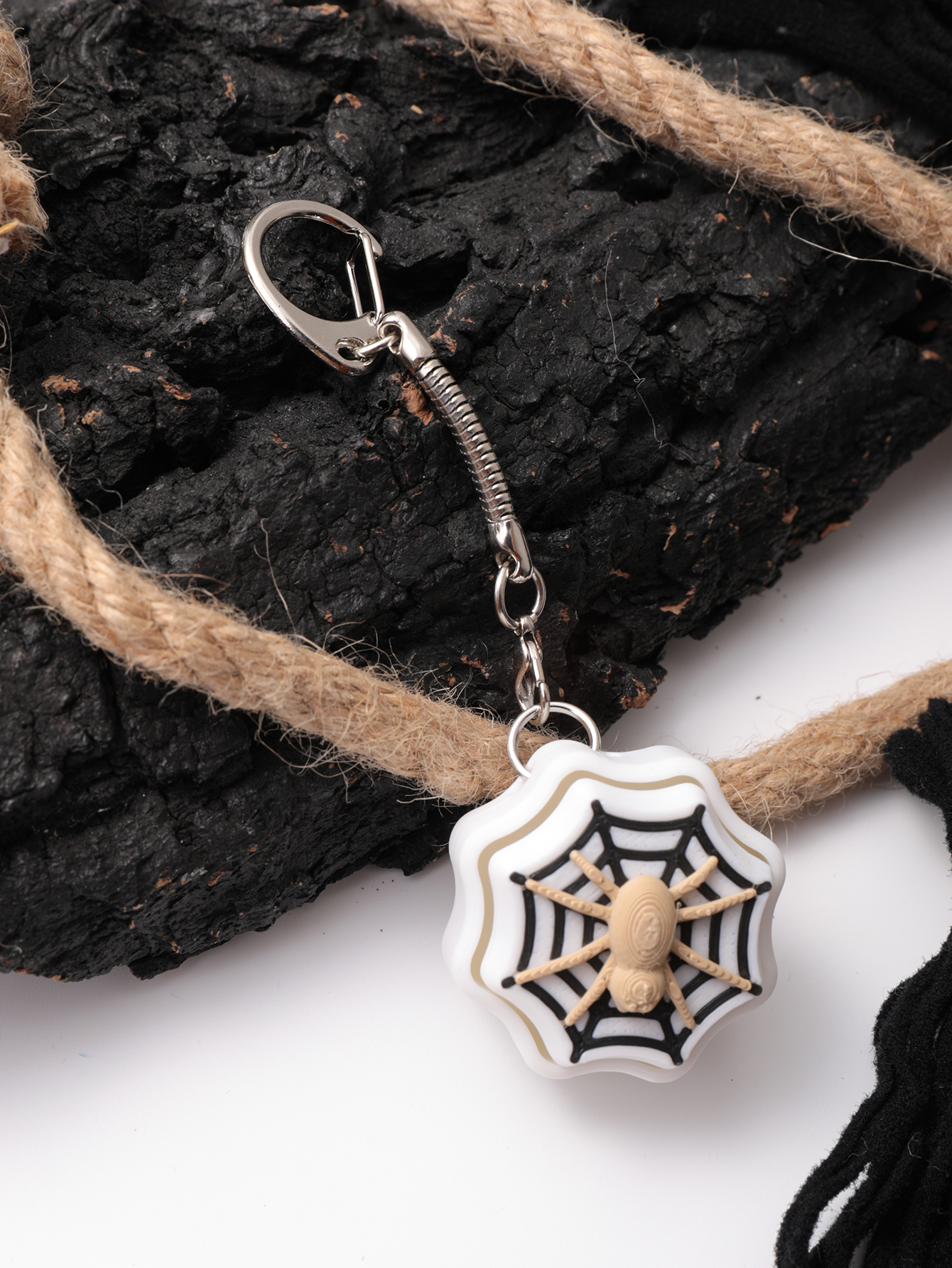 3D printed spider keychain - an adult stress relief toy with a portable anxiety-reducing gadget featuring a clickable keyboard design