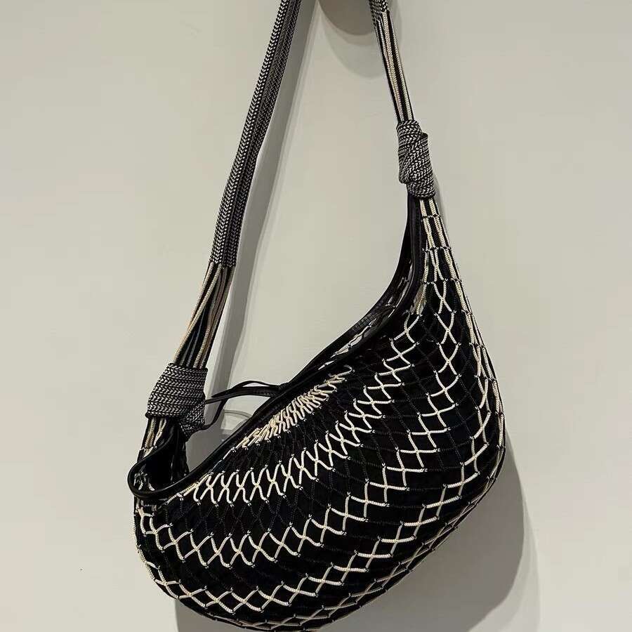 Designer Bag Tote Bag Designer Shoulder Contemporary Fashion Forward Messenger Style Satchel Featuring Distinctive Color Blocks and Horn Accents