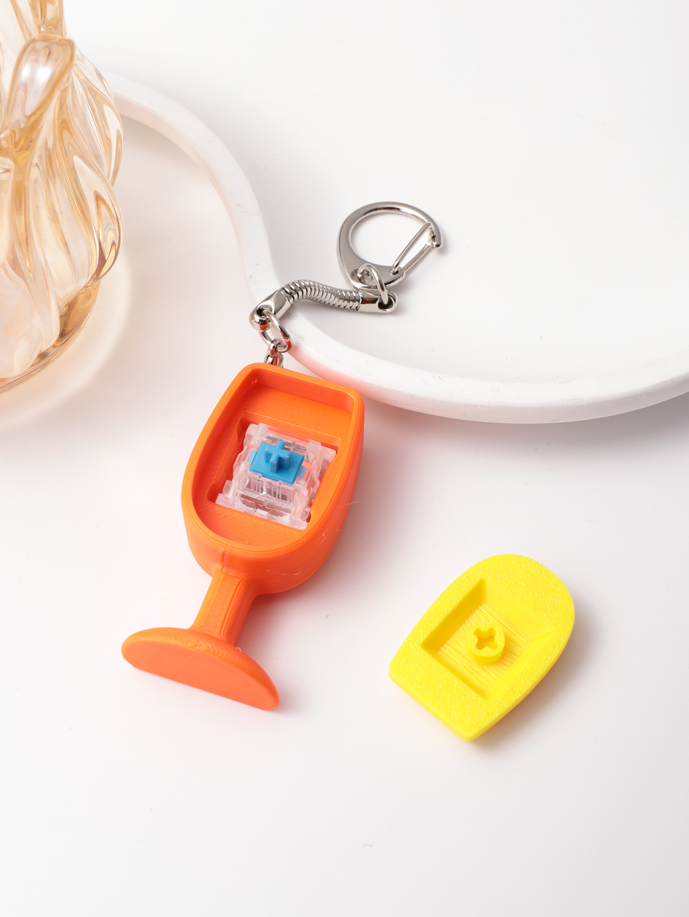 3D printed cocktail cup-shaped keychain - adult stress relief toy, with a portable anxiety relief gadget featuring a clickable keyboard design