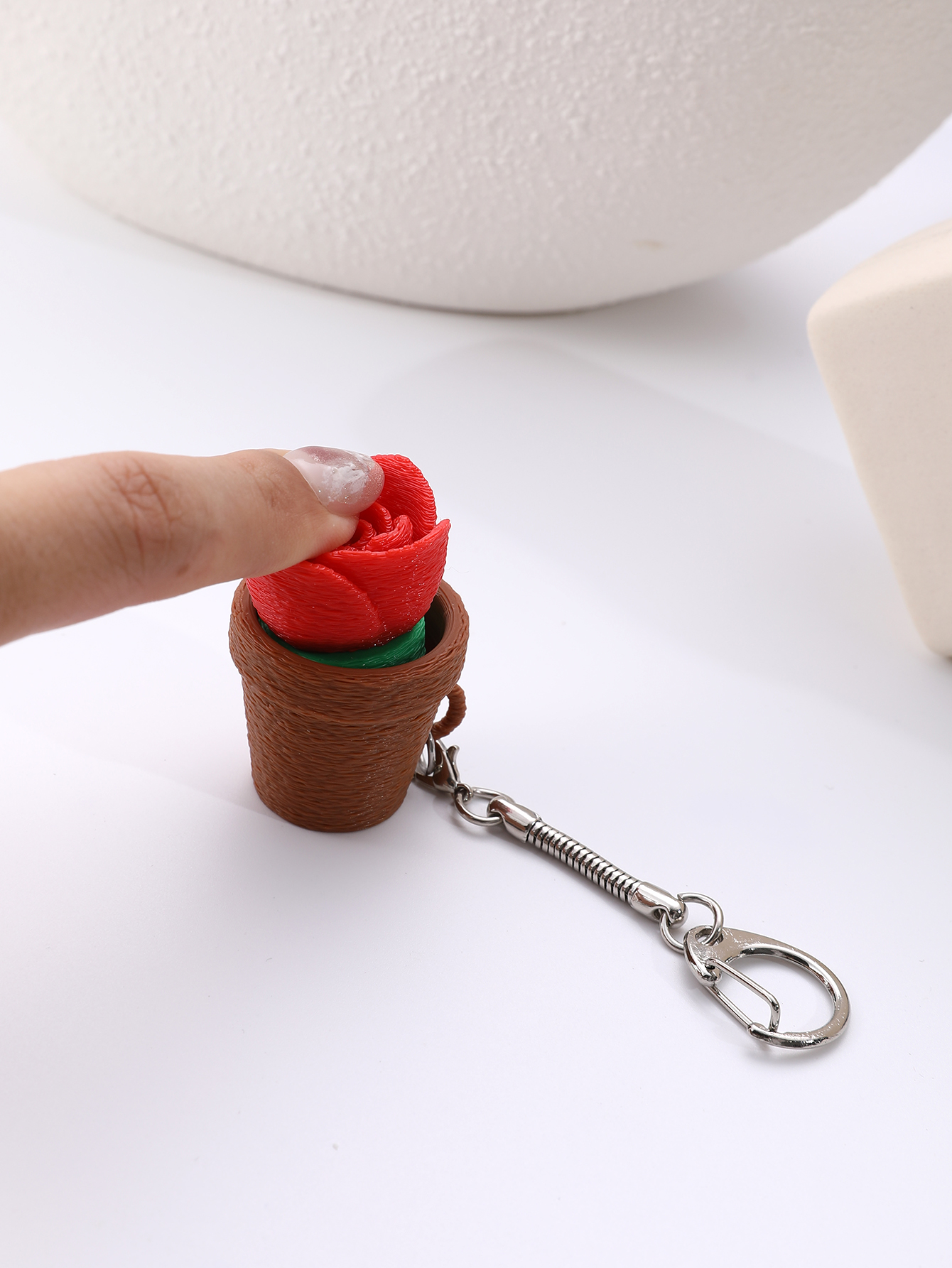 3D printed small potted plant hangers - adult stress relief toys, with a portable anxiety relief tool featuring a clickable keyboard design