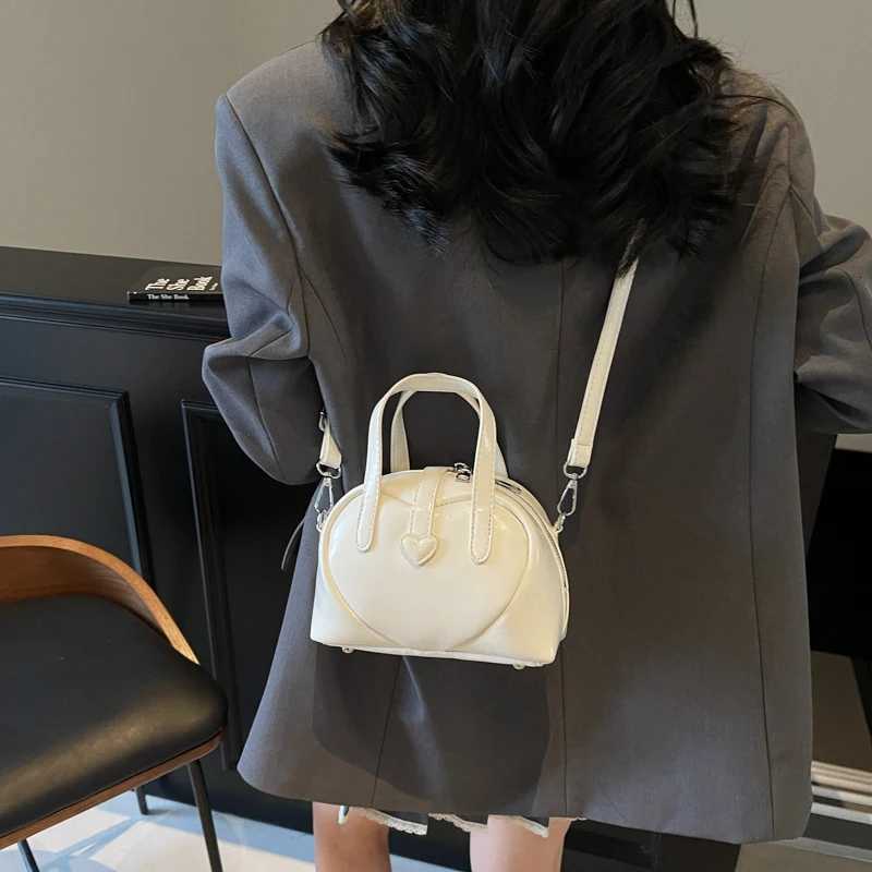 2025 Sweet Heart Decorated Mini Shoulder Crossbody Bags for Women Latest Designer Handbags Luxury Pure Color Top-handle Saddle Bag Y250725