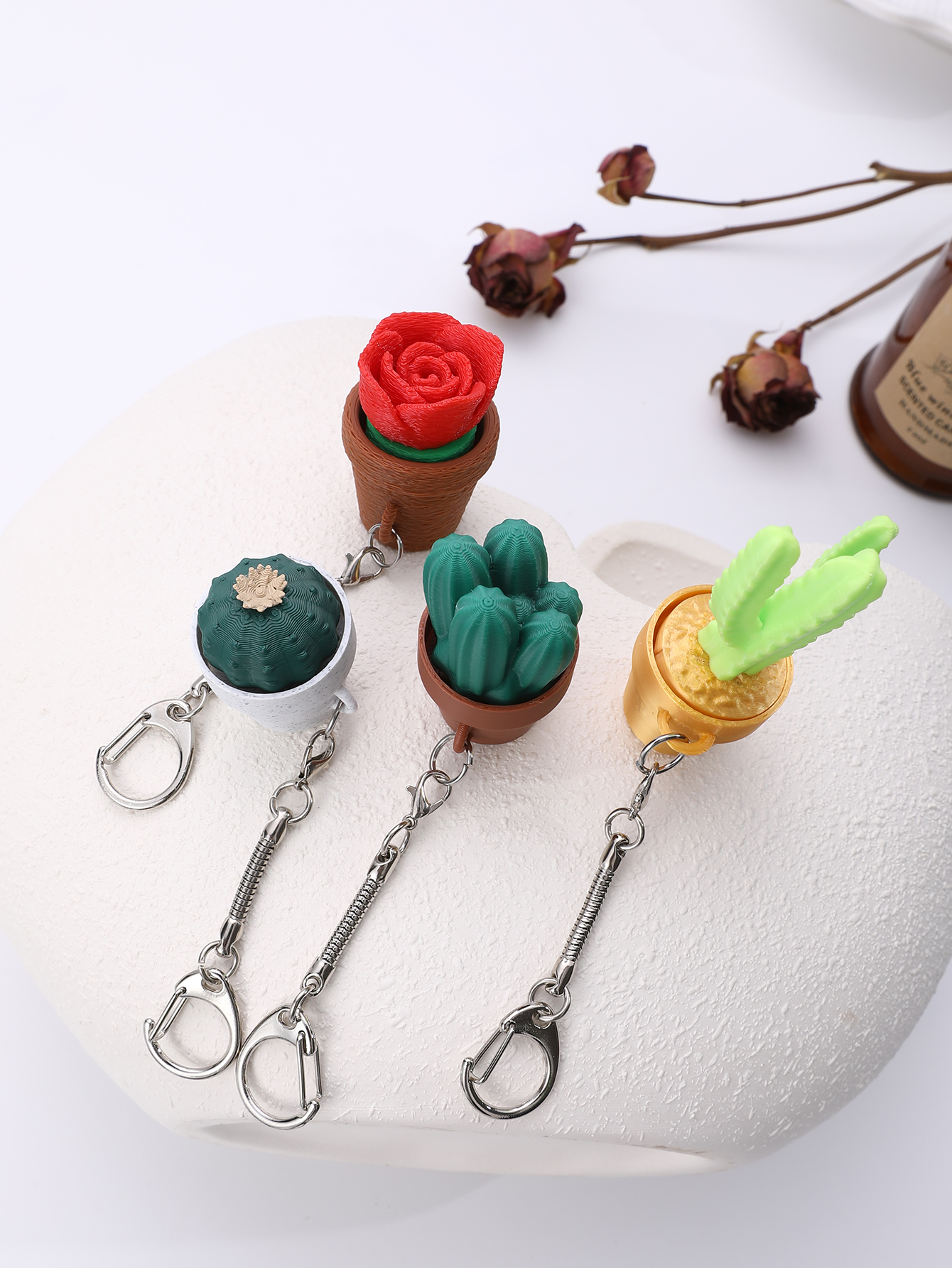 3D printed small potted plant hangers - adult stress relief toys, with a portable anxiety relief tool featuring a clickable keyboard design