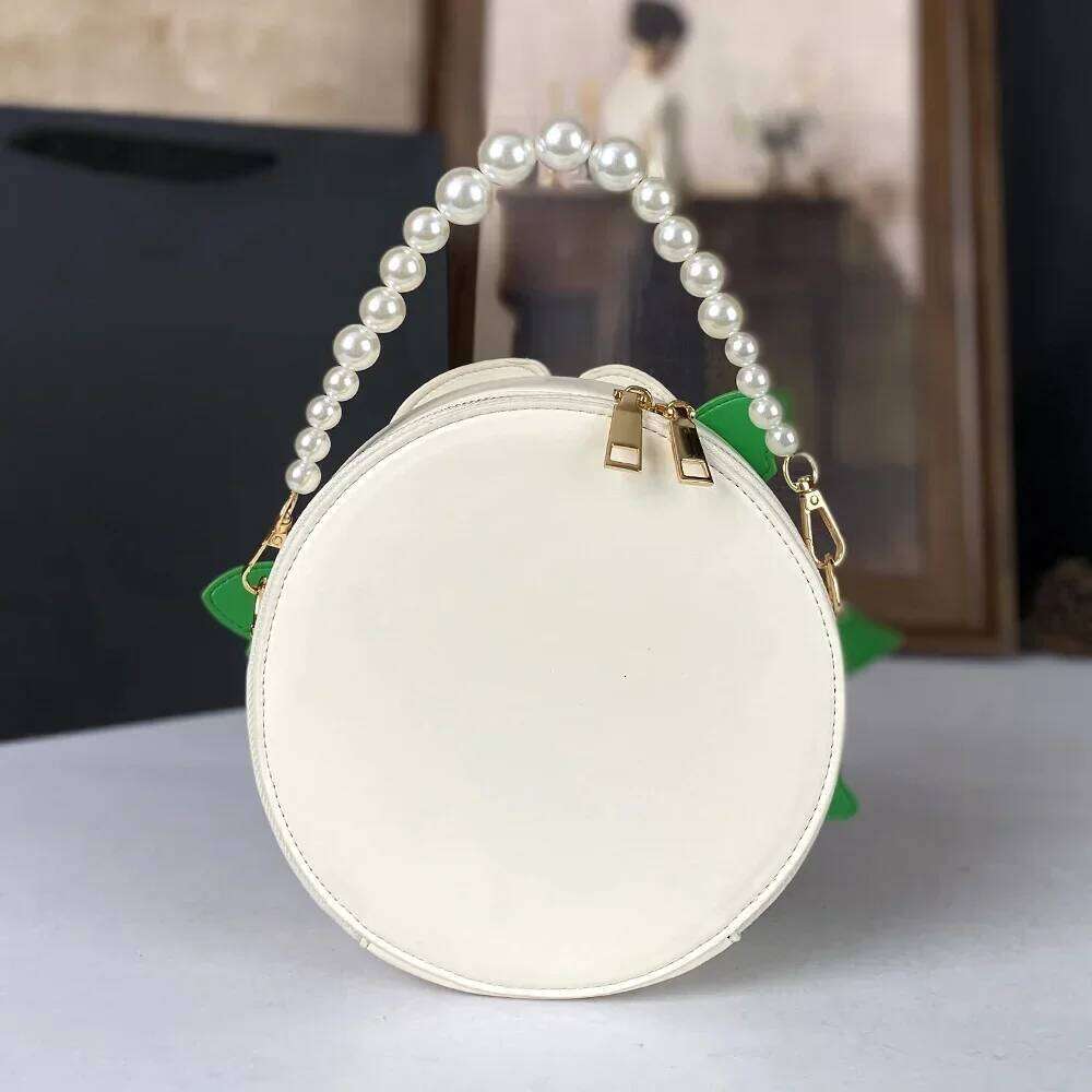 Luxurious designer 2025 New Personalized Fashion Flower Versatile Sweet Pearl Handheld Small Single Cross Shoulder Women's Bag
