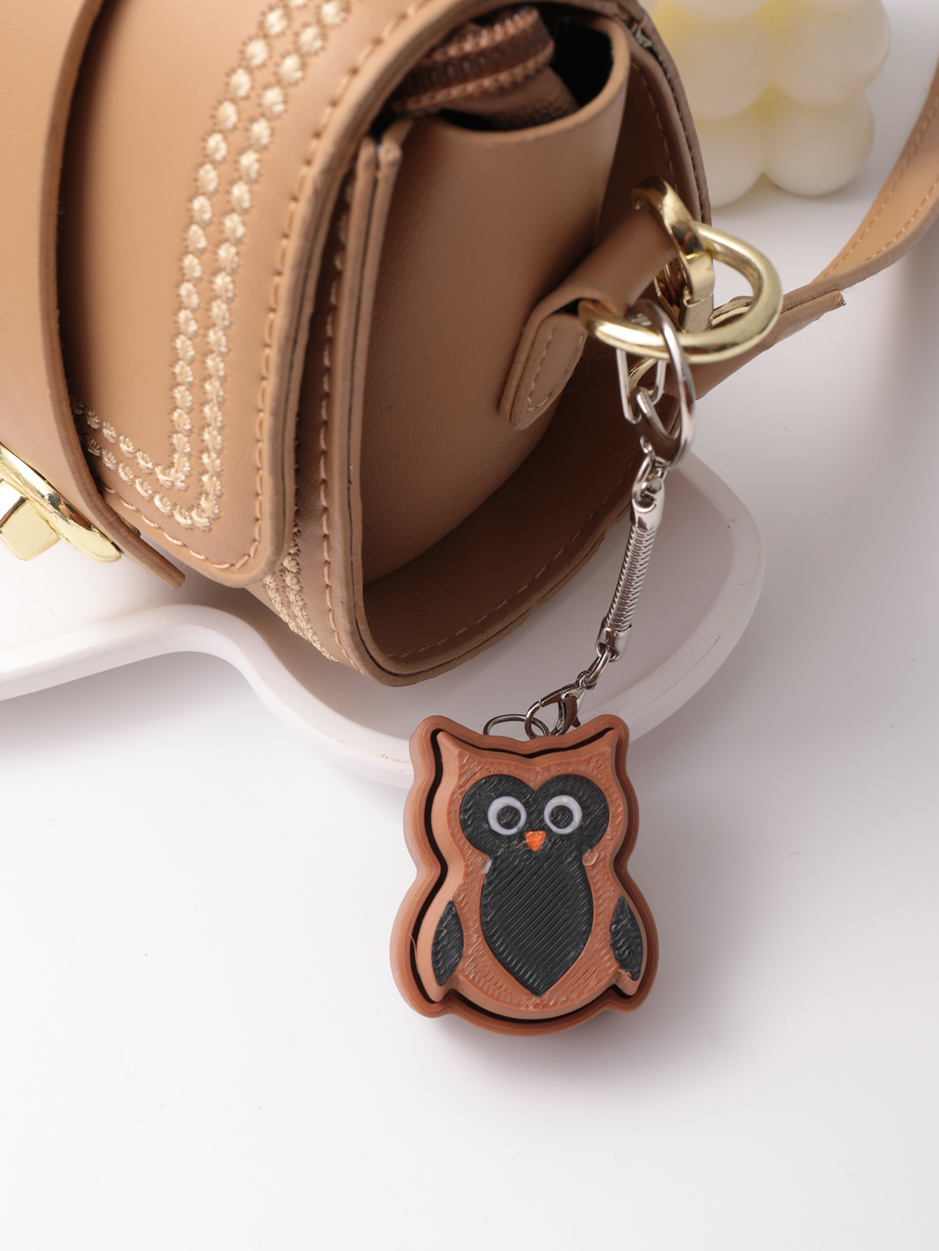 3D printed owl keychain - an adult stress relief toy with a portable anxiety-reducing gadget featuring a clickable keyboard design